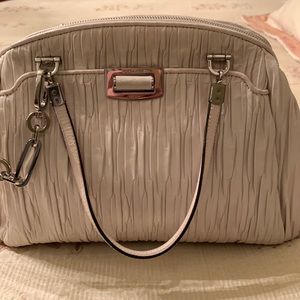 Leather Coach bag, off white color, wear it with anything!
